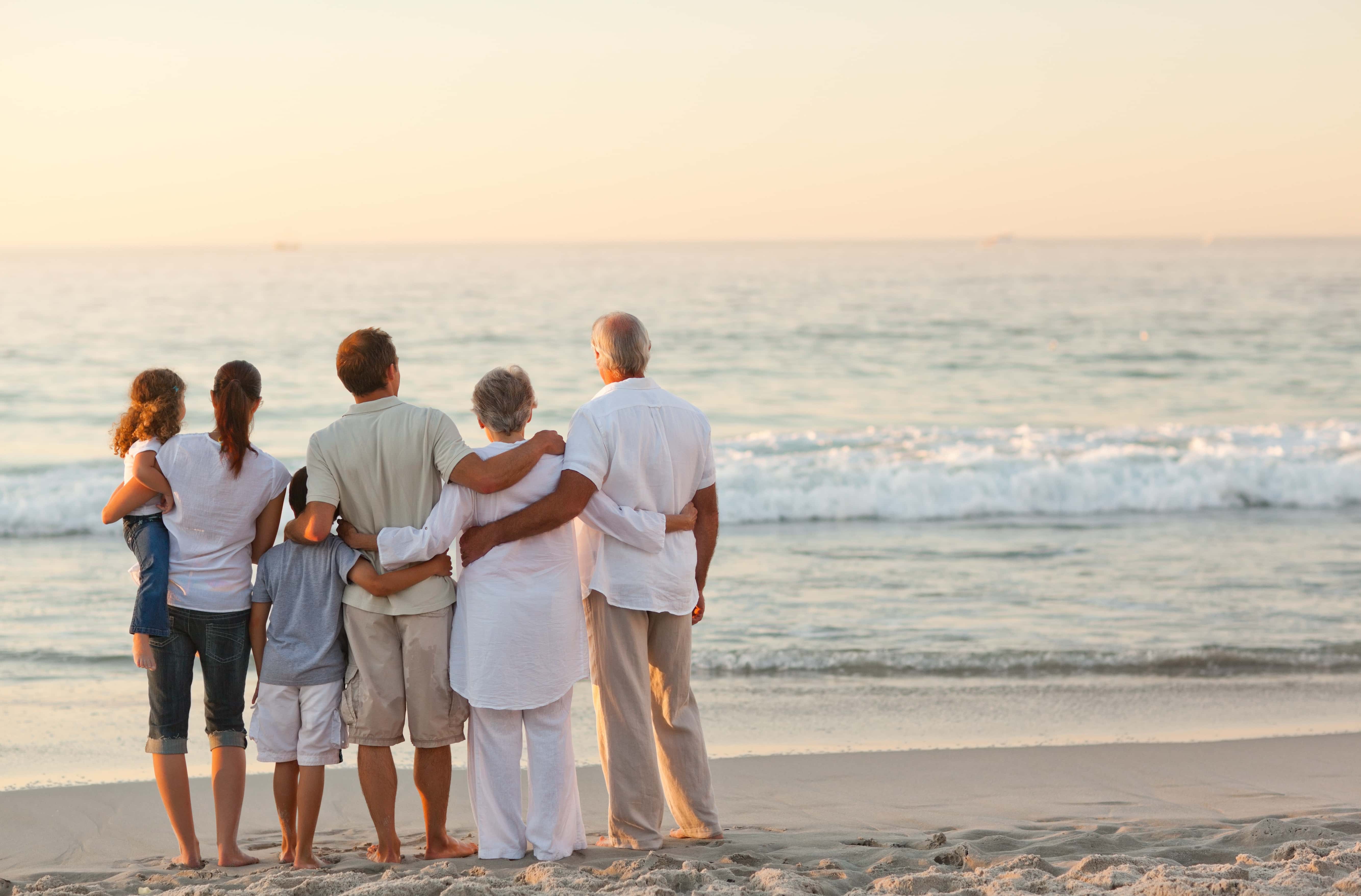 Intergenerational family on beach
