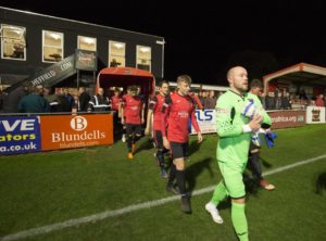Sheffield FC players walk out onto the pitch