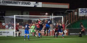 The reds of Sheffield FC defend a set play