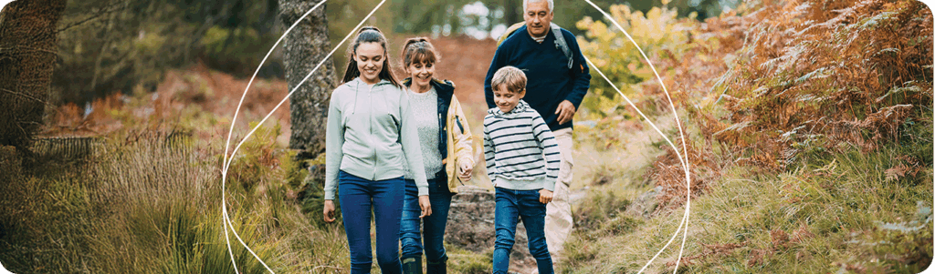 Family walking in a forest