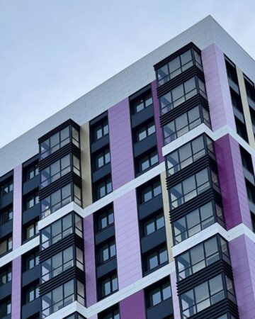 The,Facade,Of,The,Building,In,Purple,geometric,Patterns,From,Windows