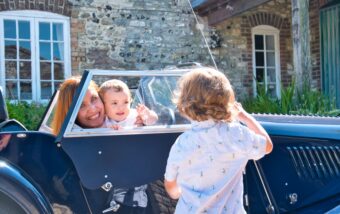 A,Family,Enjoys,Their,New,Classic,Car,In,The,Countryside