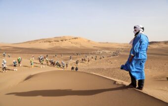 Climbing up a sand dune during the Marathon des Sables