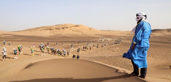 Climbing up a sand dune during the Marathon des Sables