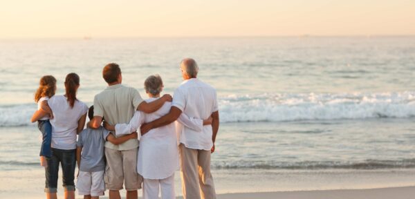 Intergenerational family on beach