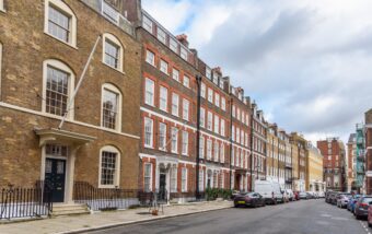 Row,Of,Historic,Town,Houses,Along,A,Street,In,A
