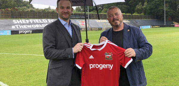 Alex Shaw, Director of Progeny, and Richard Tims, Chairman of Sheffield FC, with the team’s new kit showing Progeny logo